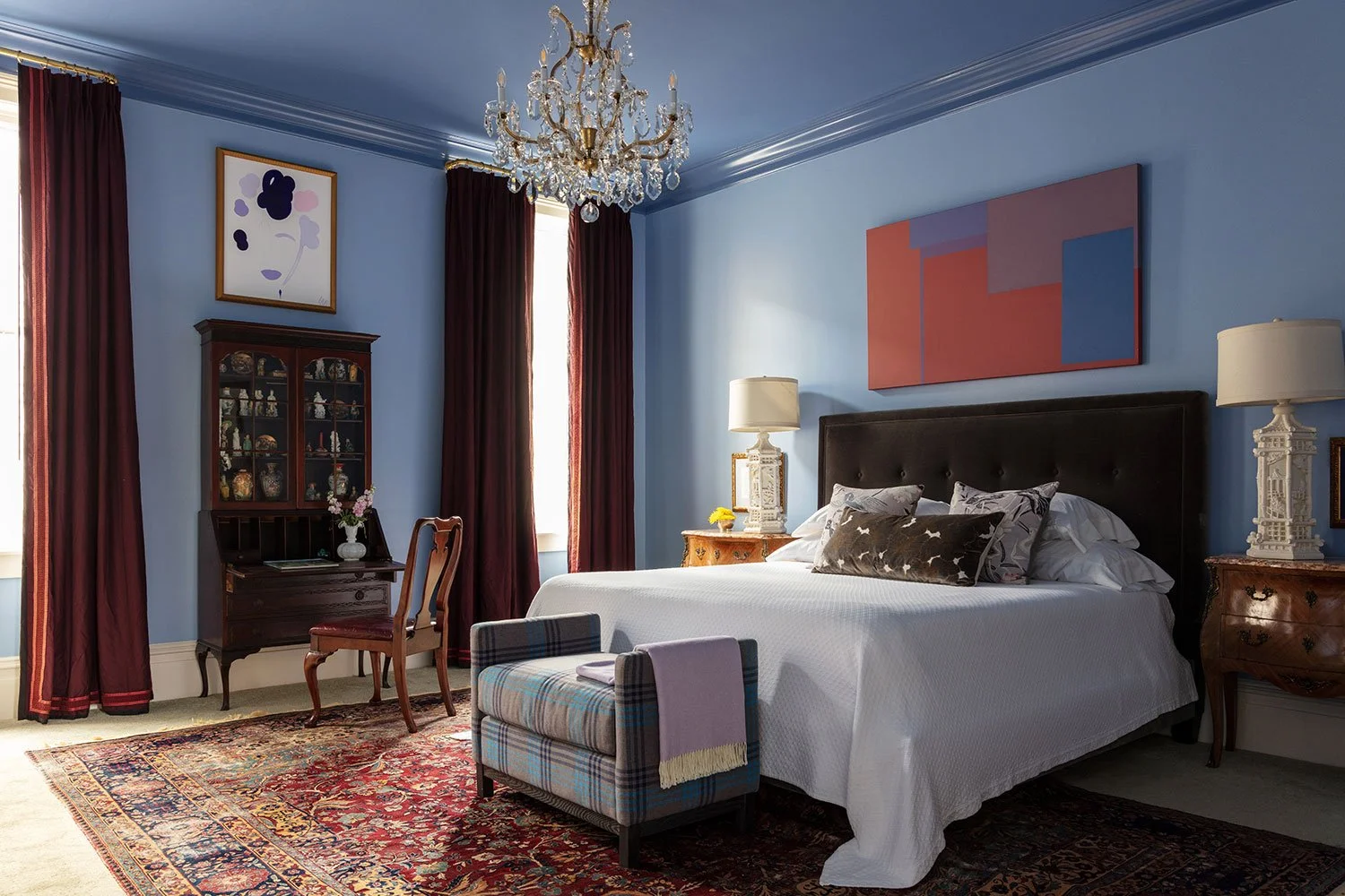 The Blue Suite at the Big Muddy Inn with chandelier and curated art